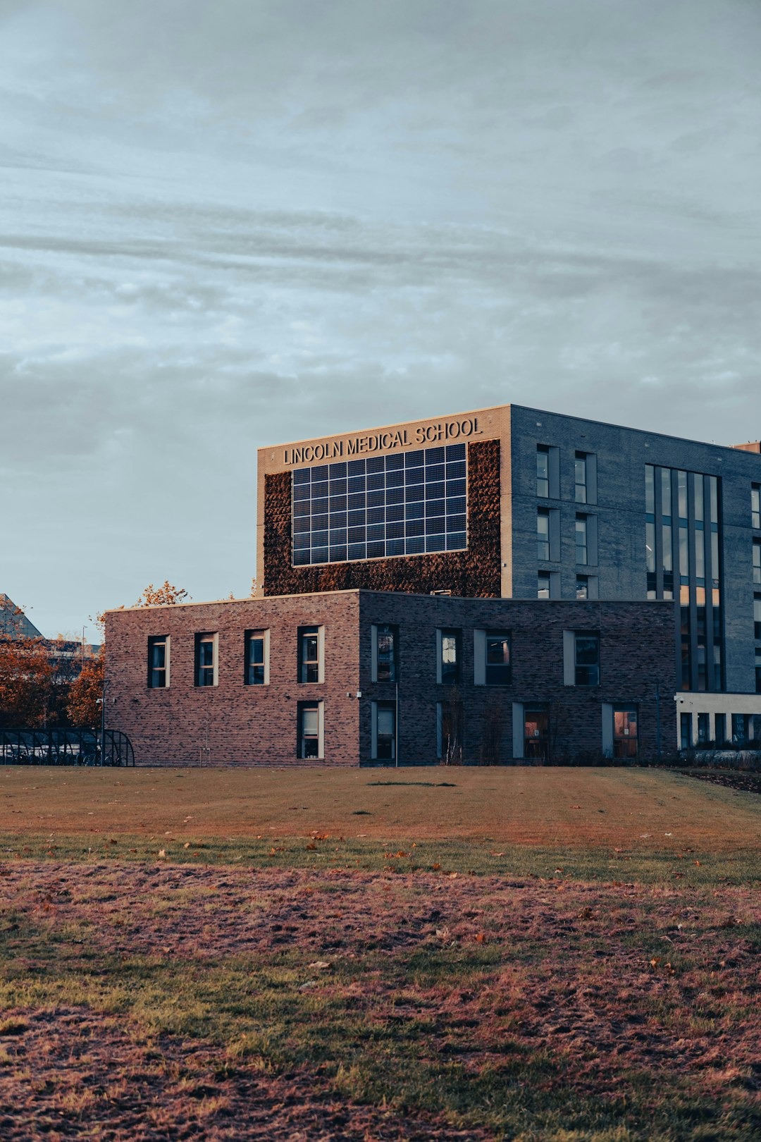 Lincoln Medical School building with living wall and solar panels.